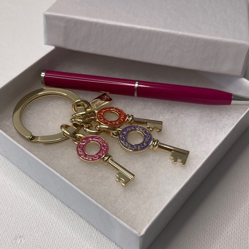 Gold Coach Keychain with Colorful Keys and a Pink Coach Pen - Picture 5 of 5